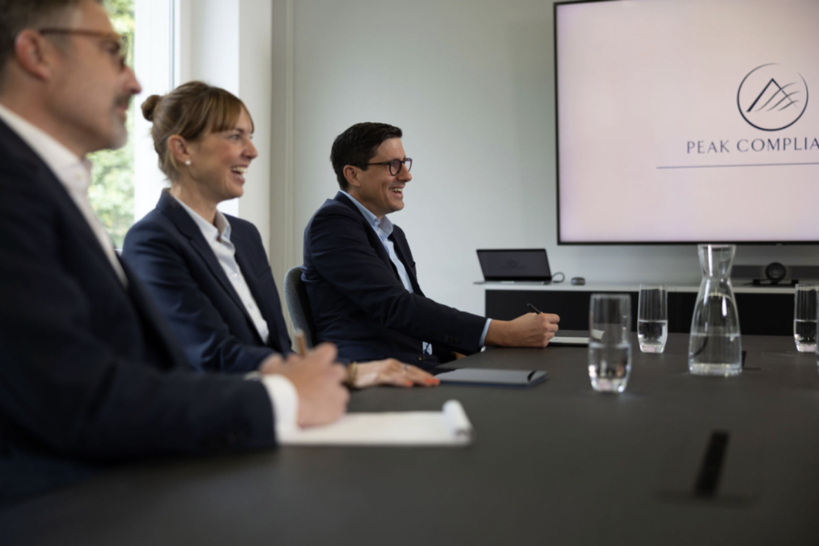 Peak Compliance AG Background