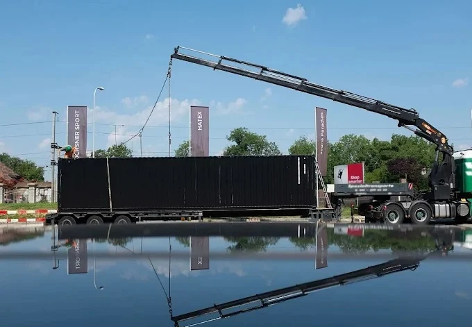 Container Lieferung mit Kranablad Schweiz
